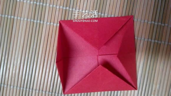 即将完全开花的荷花的折纸方法图解过程(图4) 即将完全开花的荷花的折纸方法图解过程(图4)
