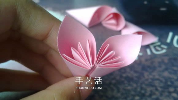 肯定学得会!超简单五瓣樱花的折纸方法步骤(图14) 肯定学得会!超简单五瓣樱花的折纸方法步骤(图14)