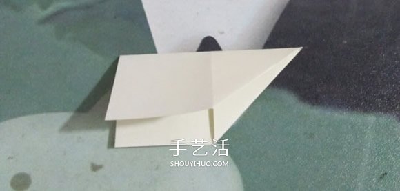 简易圣诞花环折纸图解 幼儿折圣诞花环的折法(图3) 简易圣诞花环折纸图解 幼儿折圣诞花环的折法(图3)