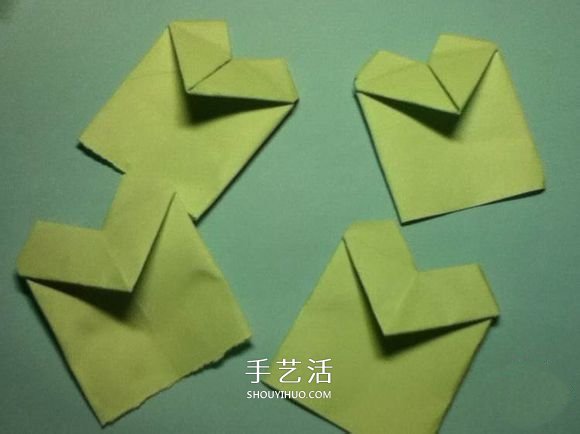 折叠四个爱心 组合成代表幸运的四叶草图解(图15) 折叠四个爱心 组合成代表幸运的四叶草图解(图15)