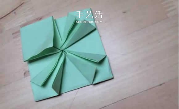 旋转纸陀螺怎么折图解 简单花型陀螺折纸教程(图12) 旋转纸陀螺怎么折图解 简单花型陀螺折纸教程(图12)