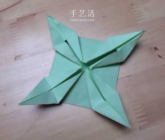 旋转纸陀螺怎么折图解 简单花型陀螺折纸教程(图16) 旋转纸陀螺怎么折图解 简单花型陀螺折纸教程(图16)