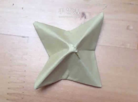 旋转纸陀螺怎么折图解 简单花型陀螺折纸教程(图32) 旋转纸陀螺怎么折图解 简单花型陀螺折纸教程(图32)