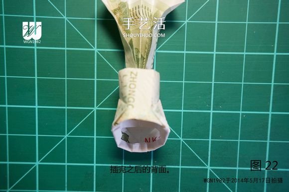 一元纸币折纸教程：鞋子里的芽苗的折法图解(图16)