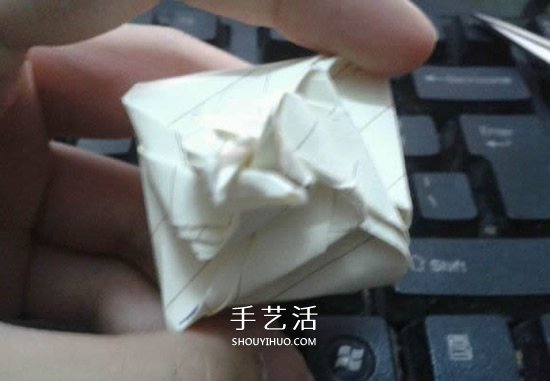 珠光海螺怎么折的教程 手工折纸海螺的步骤图(图30) 珠光海螺怎么折的教程 手工折纸海螺的步骤图(图30)