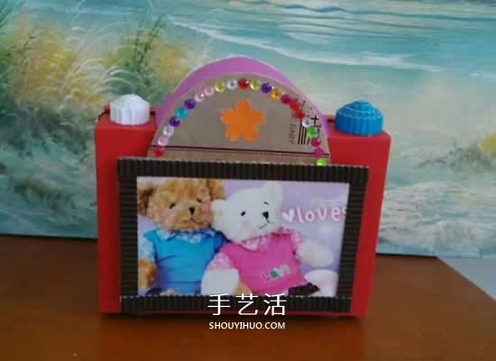 幼儿园手工作品图片 废物利用做的漂亮相机(图6) 幼儿园手工作品图片 废物利用做的漂亮相机(图6)