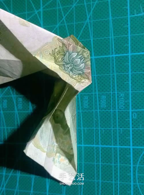 六角徽章的折法图解 一元纸币折纸六角徽章(图9) 六角徽章的折法图解 一元纸币折纸六角徽章(图9)