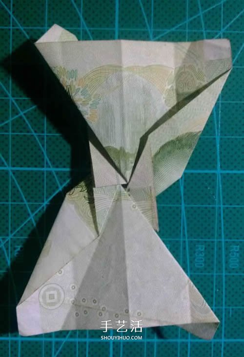 六角徽章的折法图解 一元纸币折纸六角徽章(图14) 六角徽章的折法图解 一元纸币折纸六角徽章(图14)
