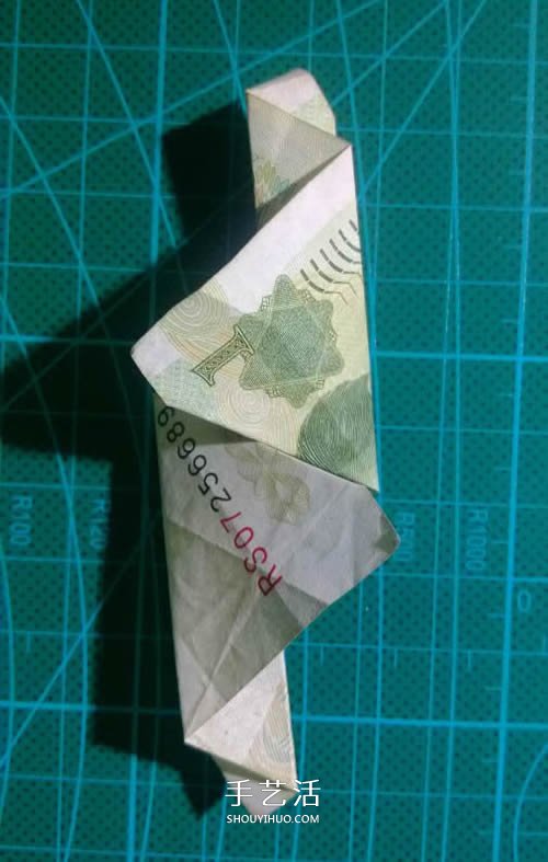 六角徽章的折法图解 一元纸币折纸六角徽章(图15) 六角徽章的折法图解 一元纸币折纸六角徽章(图15)