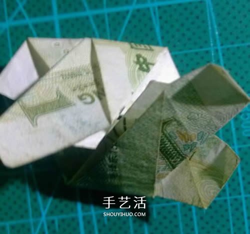 六角徽章的折法图解 一元纸币折纸六角徽章(图16) 六角徽章的折法图解 一元纸币折纸六角徽章(图16)
