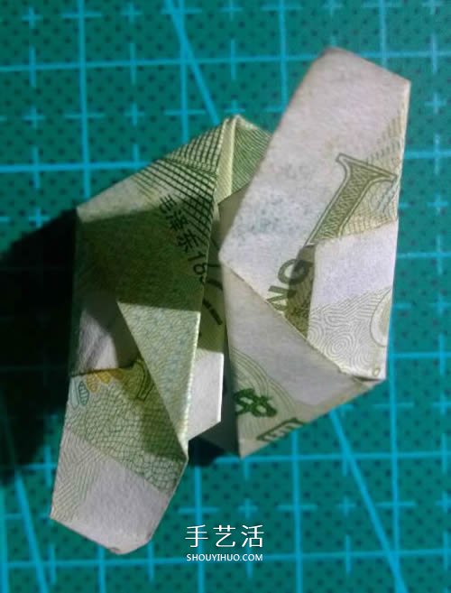 六角徽章的折法图解 一元纸币折纸六角徽章(图17) 六角徽章的折法图解 一元纸币折纸六角徽章(图17)