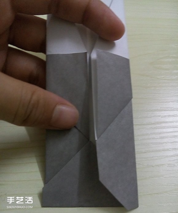 折纸折叠小刀的折法 手工折可折叠弹簧刀图解(图10) 折纸折叠小刀的折法 手工折可折叠弹簧刀图解(图10)