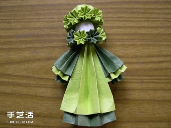 折纸娃娃的制作方法 穿裙子娃娃的折法图解 - 诺云双维造物网