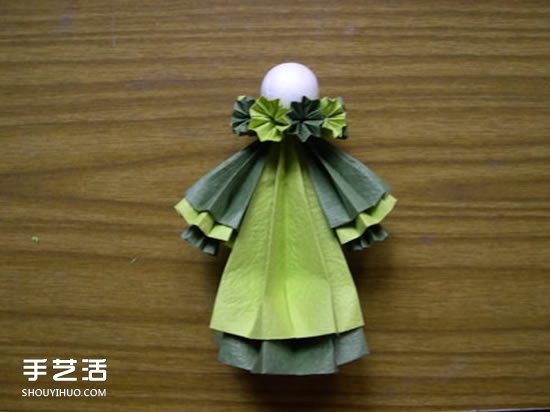 折纸娃娃的制作方法 穿裙子娃娃的折法图解(图13) 折纸娃娃的制作方法 穿裙子娃娃的折法图解(图13)