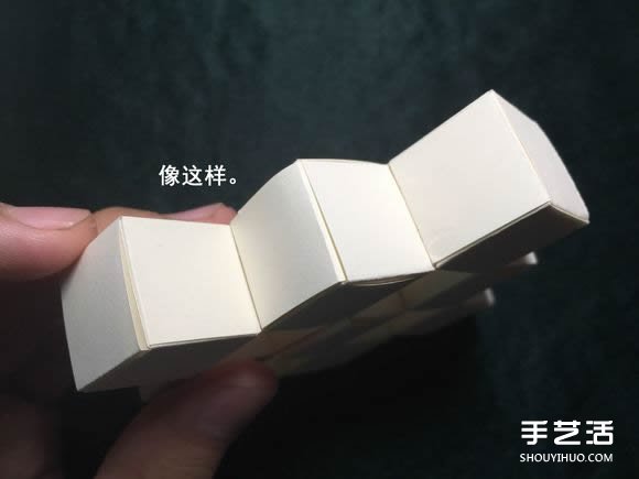 折纸会跳舞的方块图解 跳舞方块玩具的折法(图66) 折纸会跳舞的方块图解 跳舞方块玩具的折法(图66)