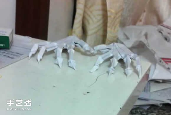 骷髅手骨的折纸方法图解 万圣节恐怖骷髅手折法(图19) 骷髅手骨的折纸方法图解 万圣节恐怖骷髅手折法(图19)